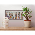 These lovable llamas are posing just for you in this colorful wall art by Eli Halpin. Beautiful streaks of rainbow lay across their furry necks, and each one is sweetly smiling your way. This animal decor would be a fun addition to any space.